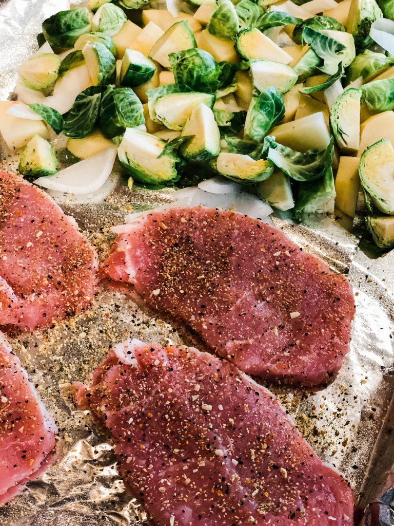 easy one pan porkchops recipe with brussel sprouts and potatoes